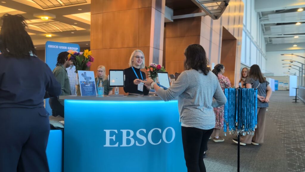 Checking in and getting a badge from the User Group team