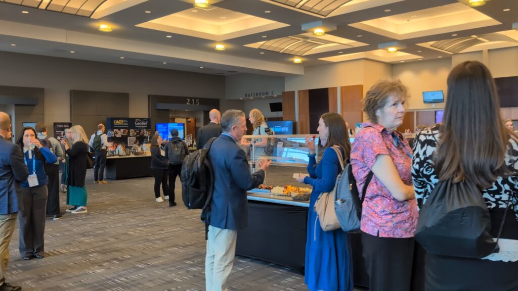 Mingling in front of snack bar during Networking Breaks