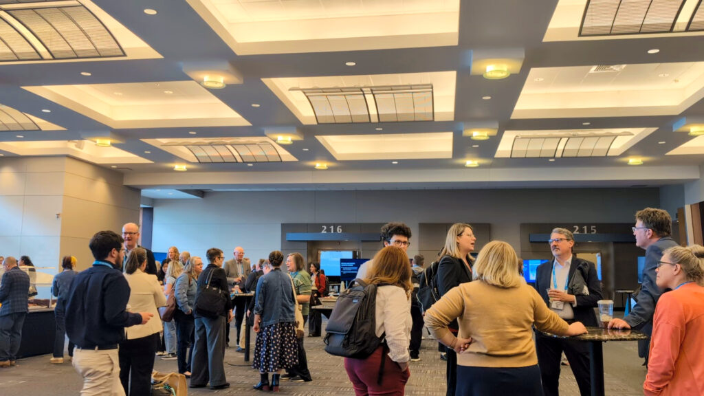 Attendees networking at the User Group
