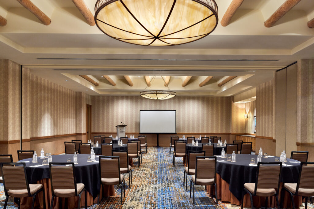 Sheraton Grand at Wild Horse Pass Scorpion breakout room with presentation podium and chairs.